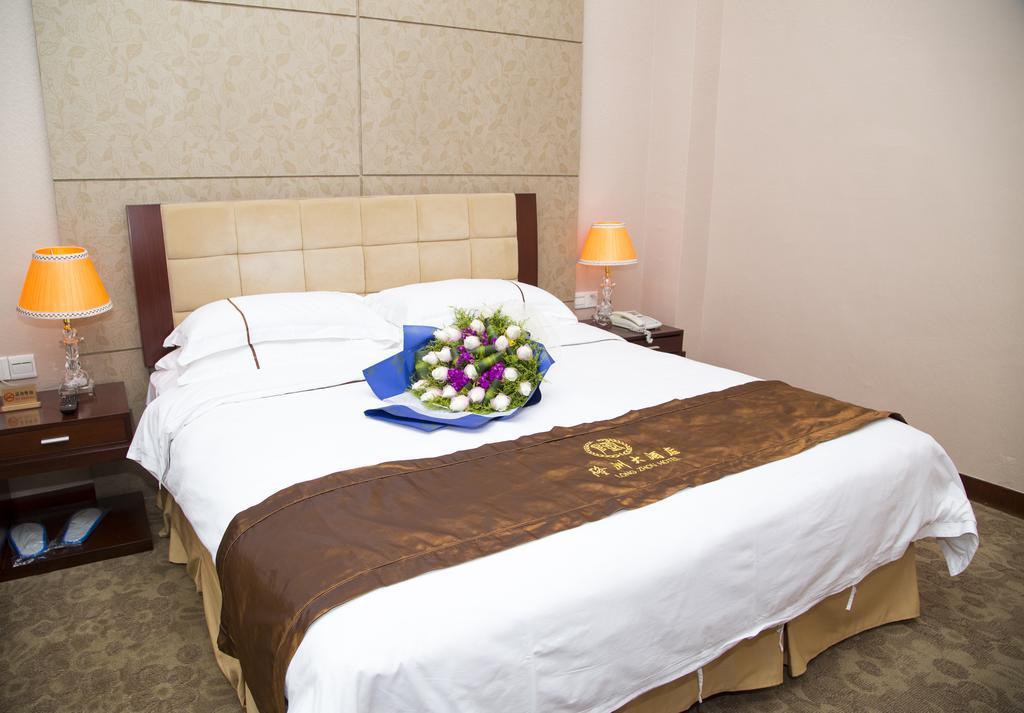 Long Zhou Grand Hotel Guangzhou Oda fotoğraf