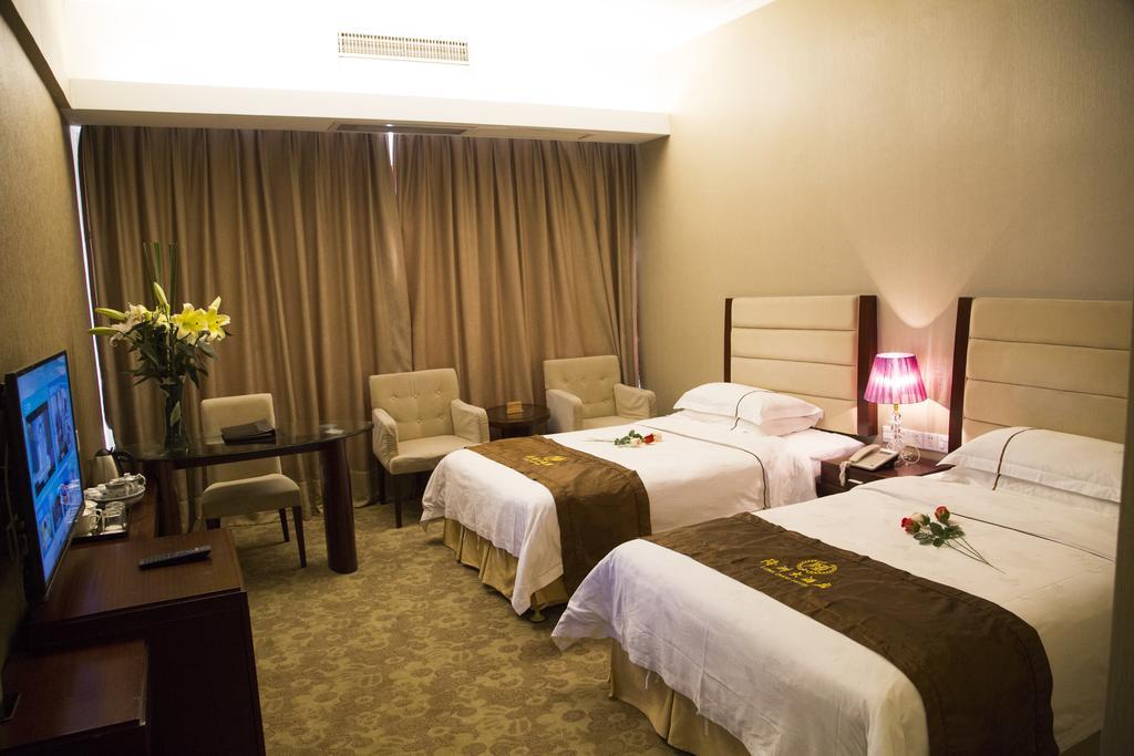 Long Zhou Grand Hotel Guangzhou Oda fotoğraf