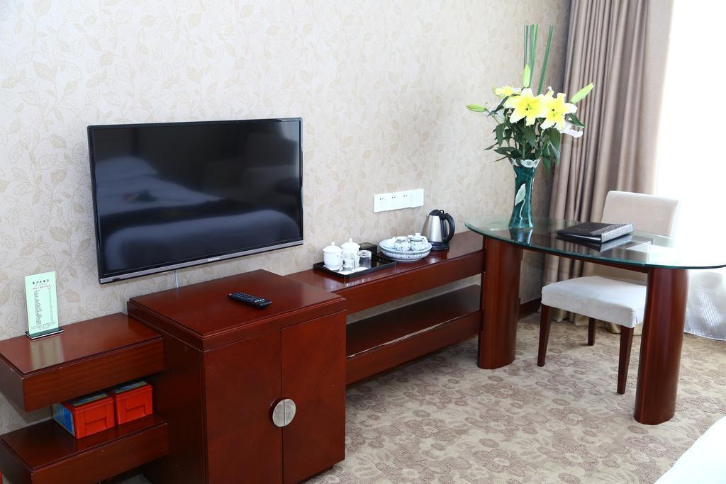 Long Zhou Grand Hotel Guangzhou Oda fotoğraf