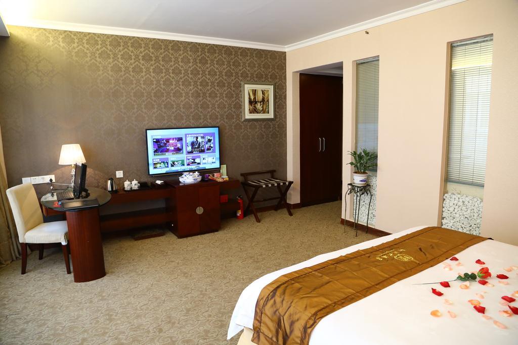 Long Zhou Grand Hotel Guangzhou Oda fotoğraf